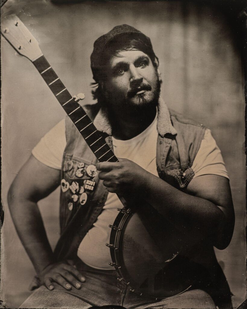 Folk Singer Willi Carlisle in the tintype studio of Arkansas Momentos, near downtown Rogers AR.